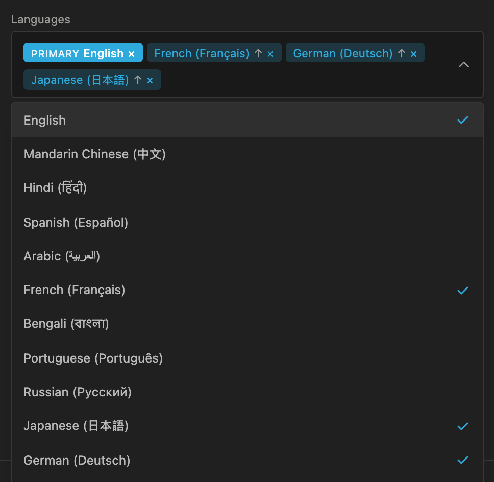 Languages 다중 선택: 지원 언어 목록이 열려 있고 그 위에 English(PRIMARY 배지), French, German, Japanese 칩이 있으며 선택된 항목에는 체크 표시가 되어 있습니다