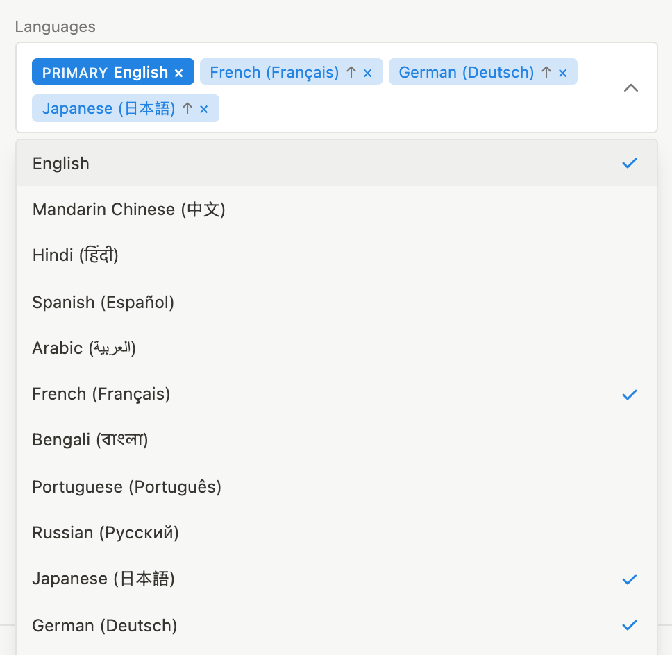 Languages 다중 선택: 지원 언어 목록이 열려 있고 그 위에 English(PRIMARY 배지), French, German, Japanese 칩이 있으며 선택된 항목에는 체크 표시가 되어 있습니다